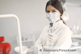 beautiful-dentist-working-dental-clinic.jpg